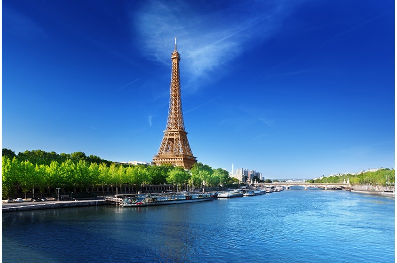 Eiffel tower in Paris with a view from the water of the Seine